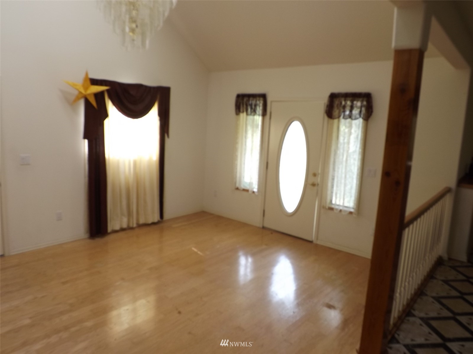 372 Olson Road Sequim, WA 98382 - Photo 8 of 22 a view of a room with wooden floor and window