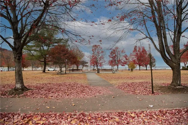 a view of a balcony with chairs