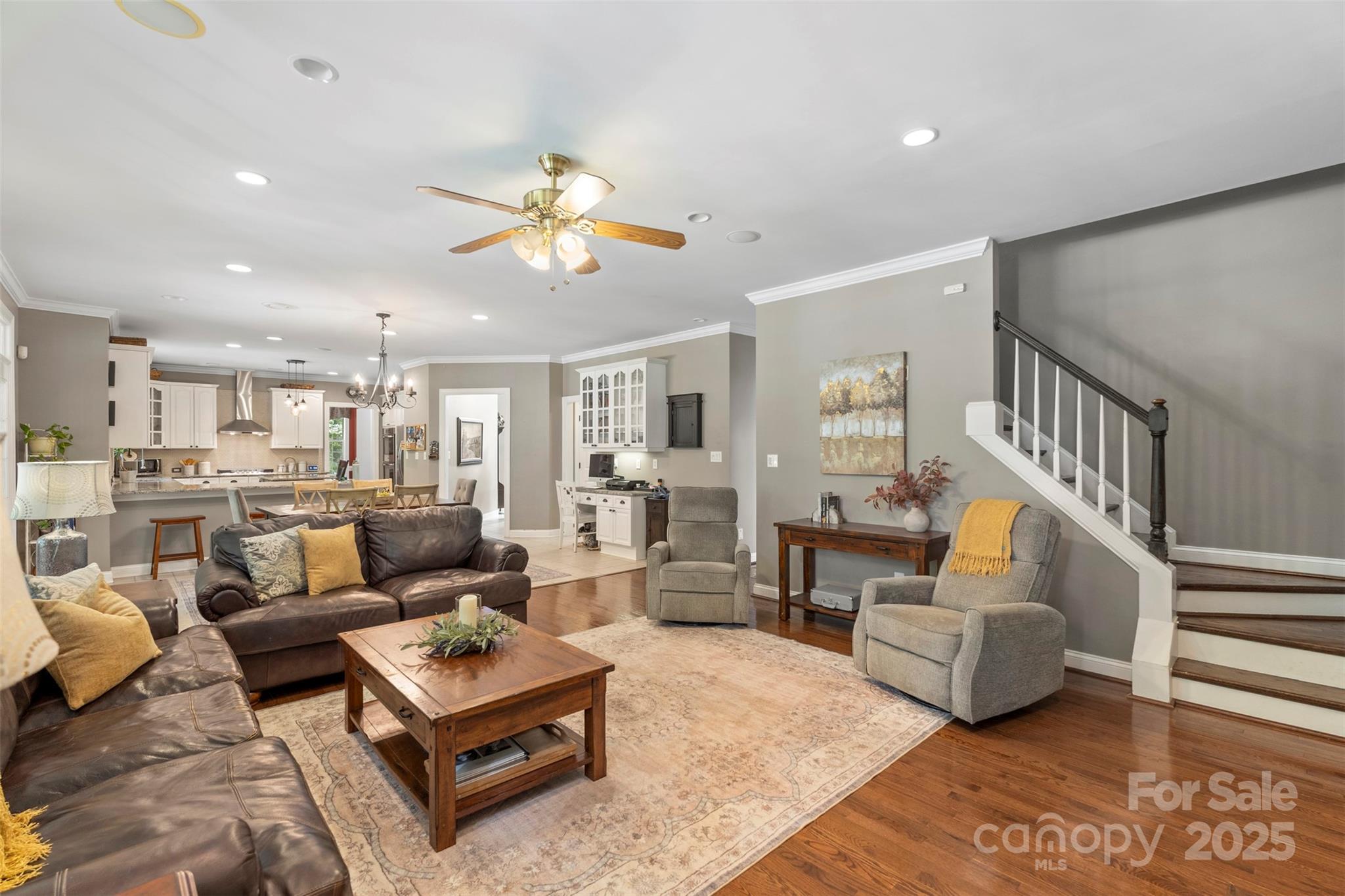 6006 Casswell Circle Matthews, NC 28104 - Photo 13 of 47 a living room with furniture kitchen view and a chandelier