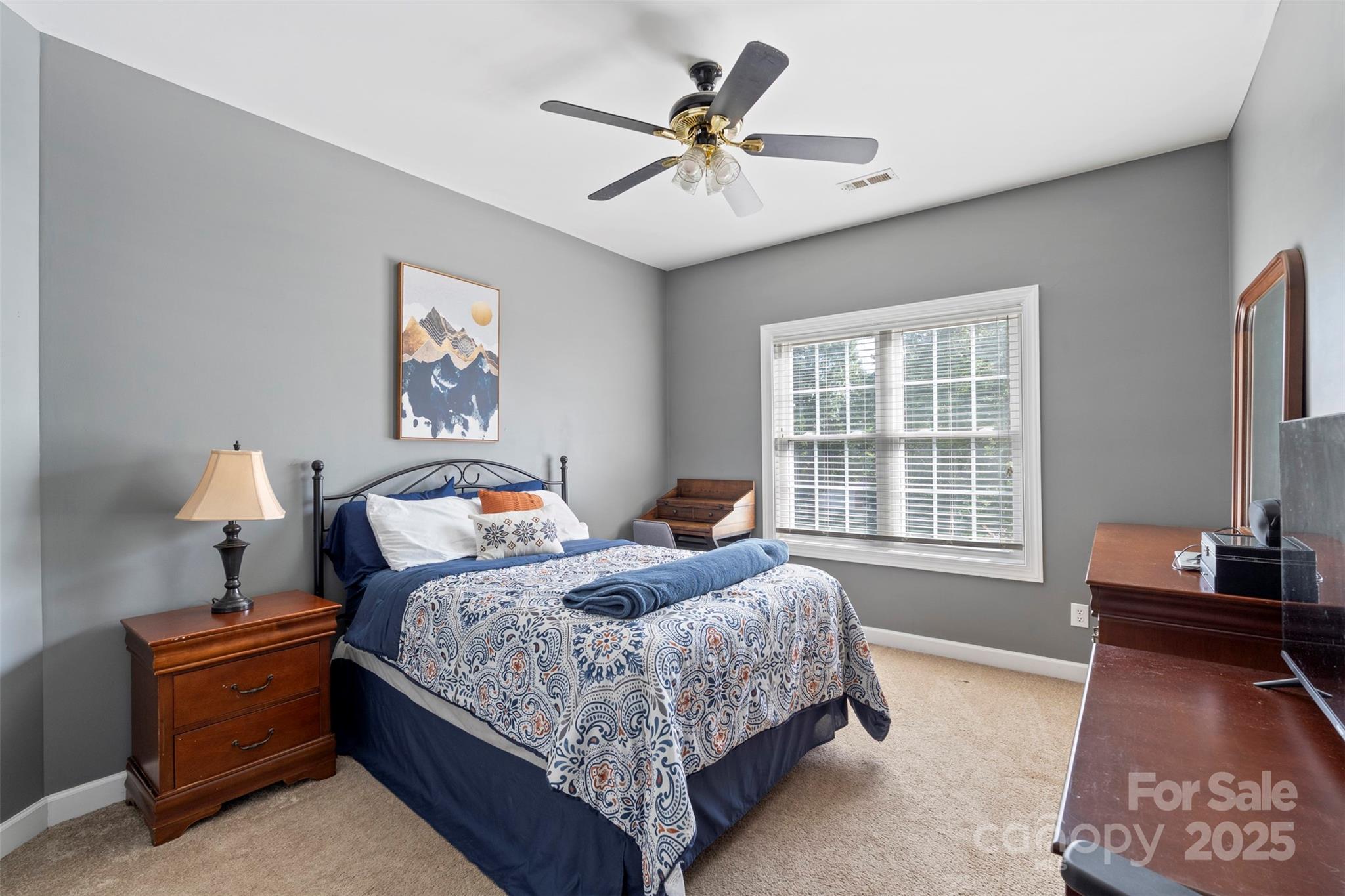 6006 Casswell Circle Matthews, NC 28104 - Photo 24 of 47 a bedroom with bed and a window