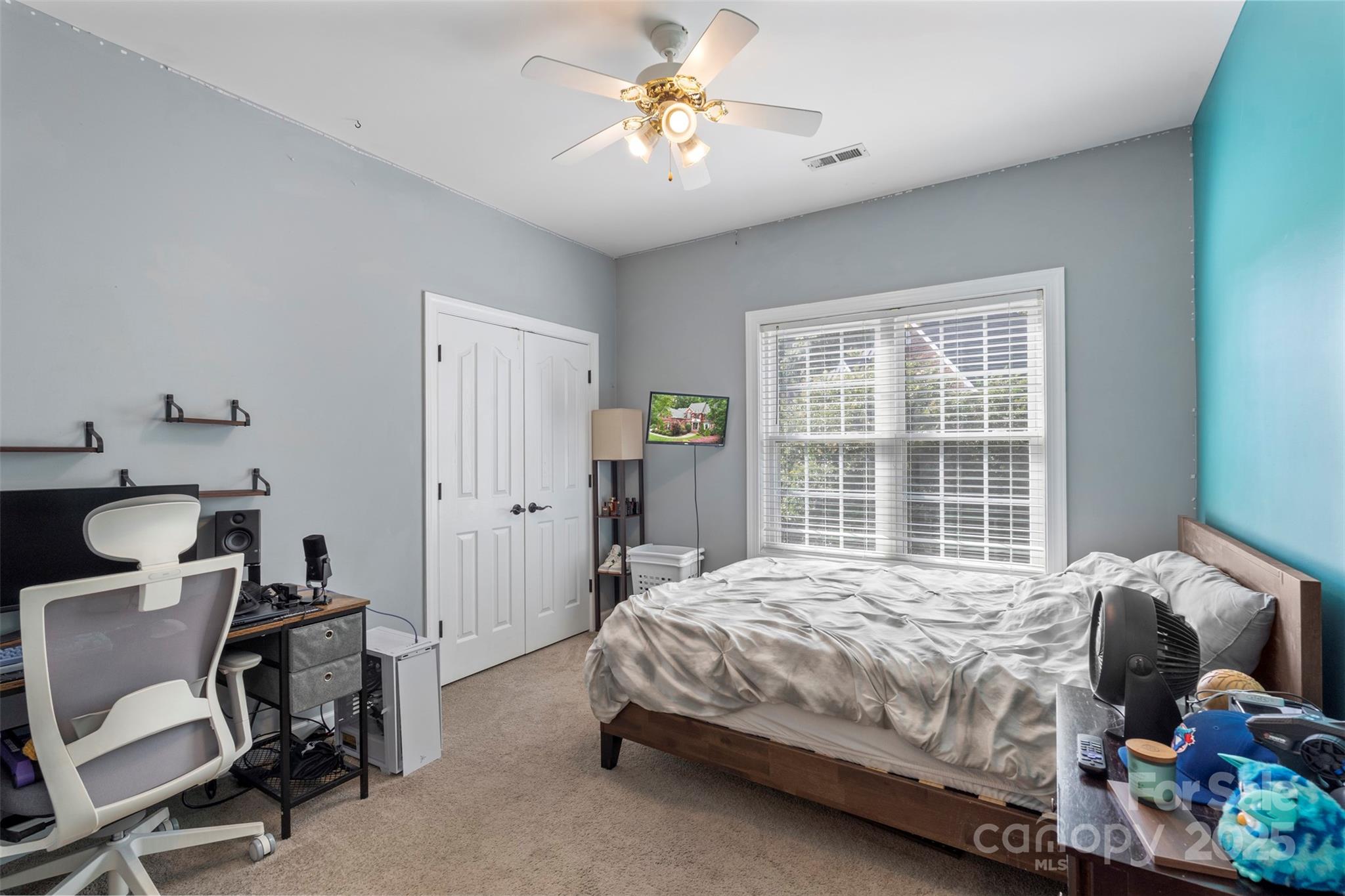 6006 Casswell Circle Matthews, NC 28104 - Photo 25 of 47 a bedroom with a bed and a window