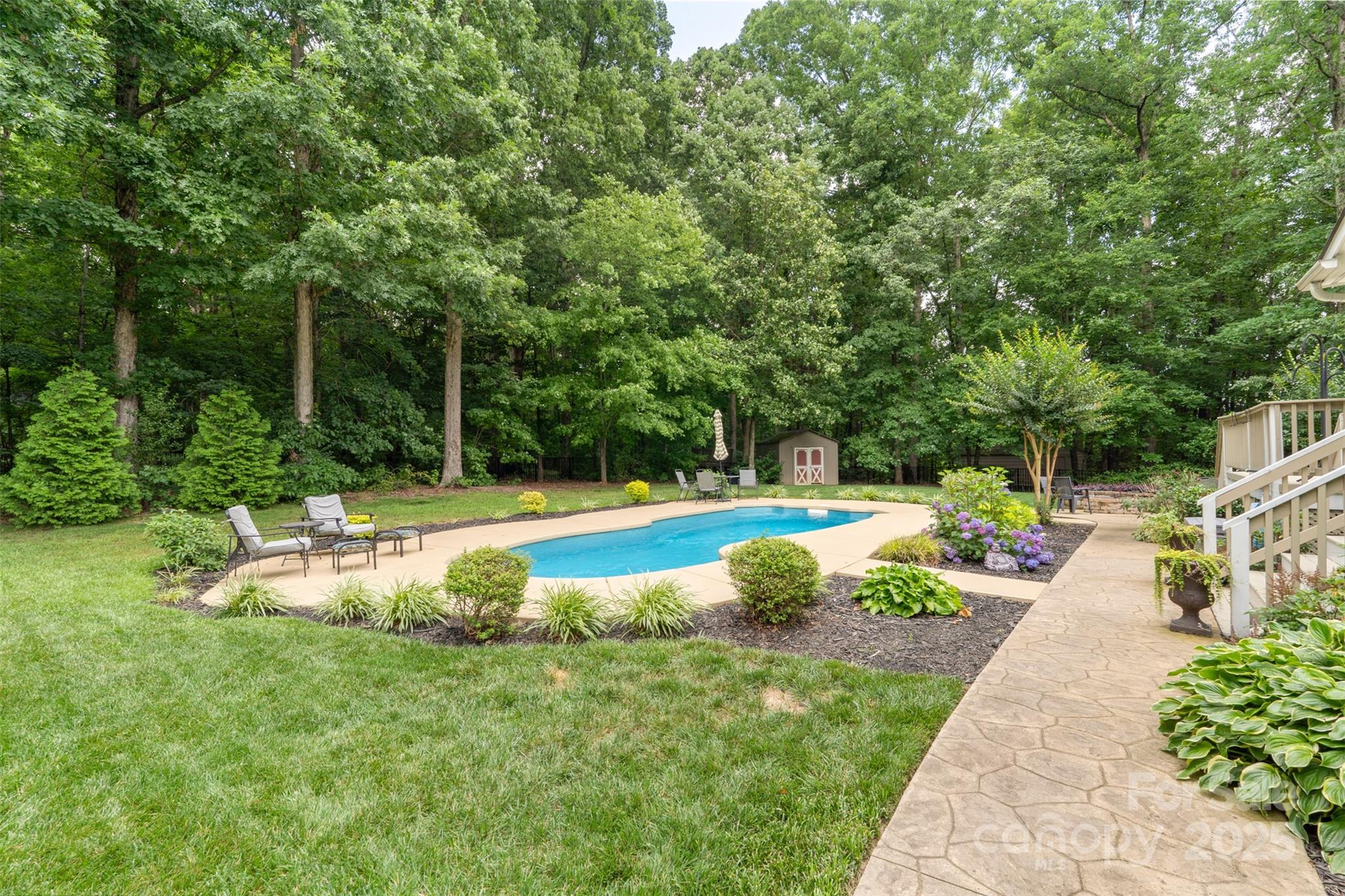 6006 Casswell Circle Matthews, NC 28104 - Photo 35 of 47 a view of a swimming pool with a patio