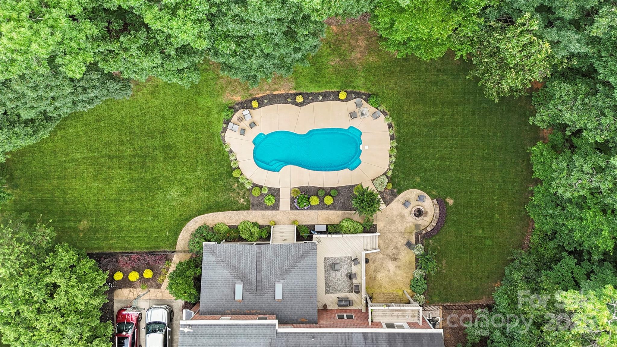 6006 Casswell Circle Matthews, NC 28104 - Photo 38 of 47 an aerial view of a house with outdoor space and swimming pool