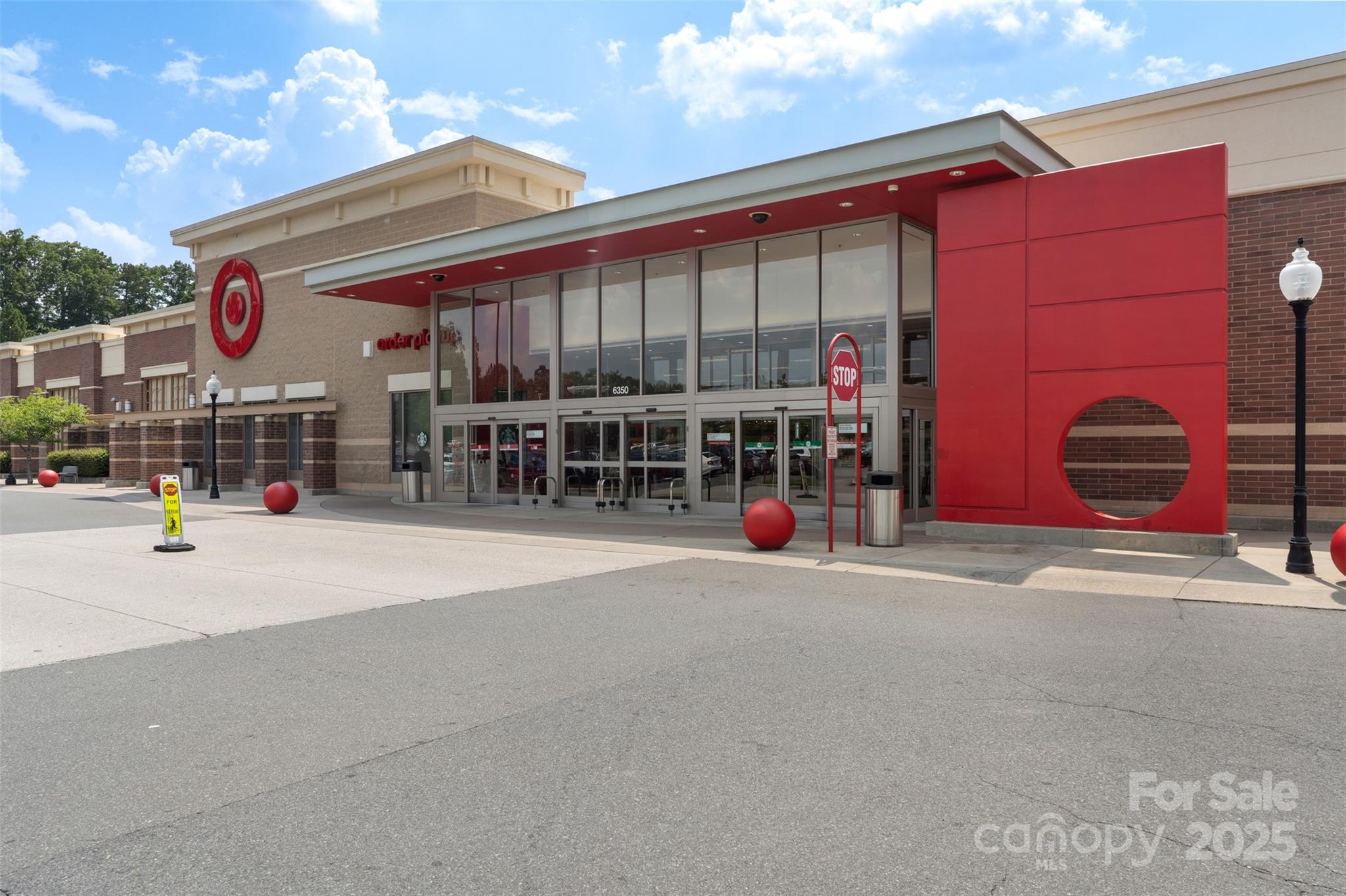 6006 Casswell Circle Matthews, NC 28104 - Photo 46 of 47 a view of a street with shops