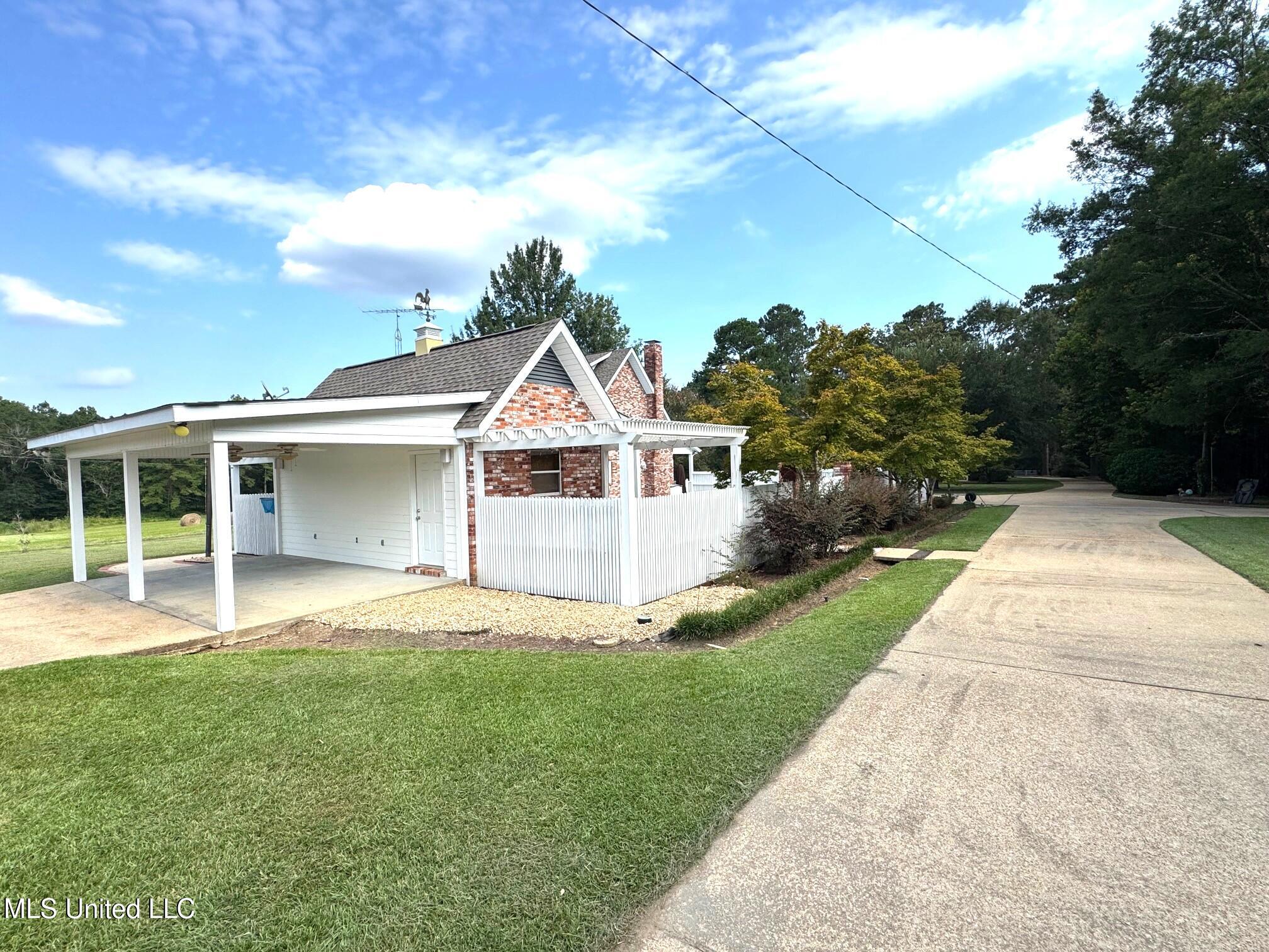 2053 Osyka Progress Road Osyka, MS 39657 - Photo 26 of 79 Pool house and drive