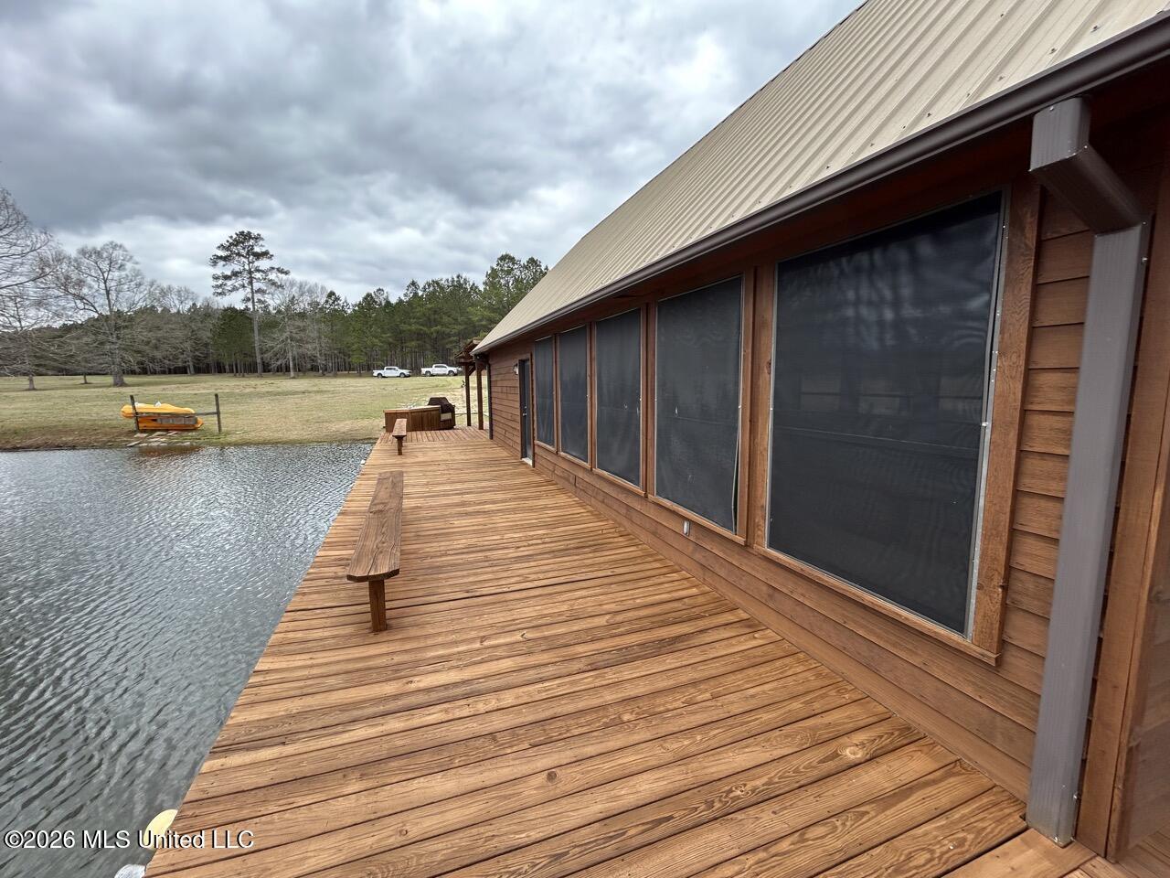 2053 Osyka Progress Road Osyka, MS 39657 - Photo 61 of 79 Lake house deck