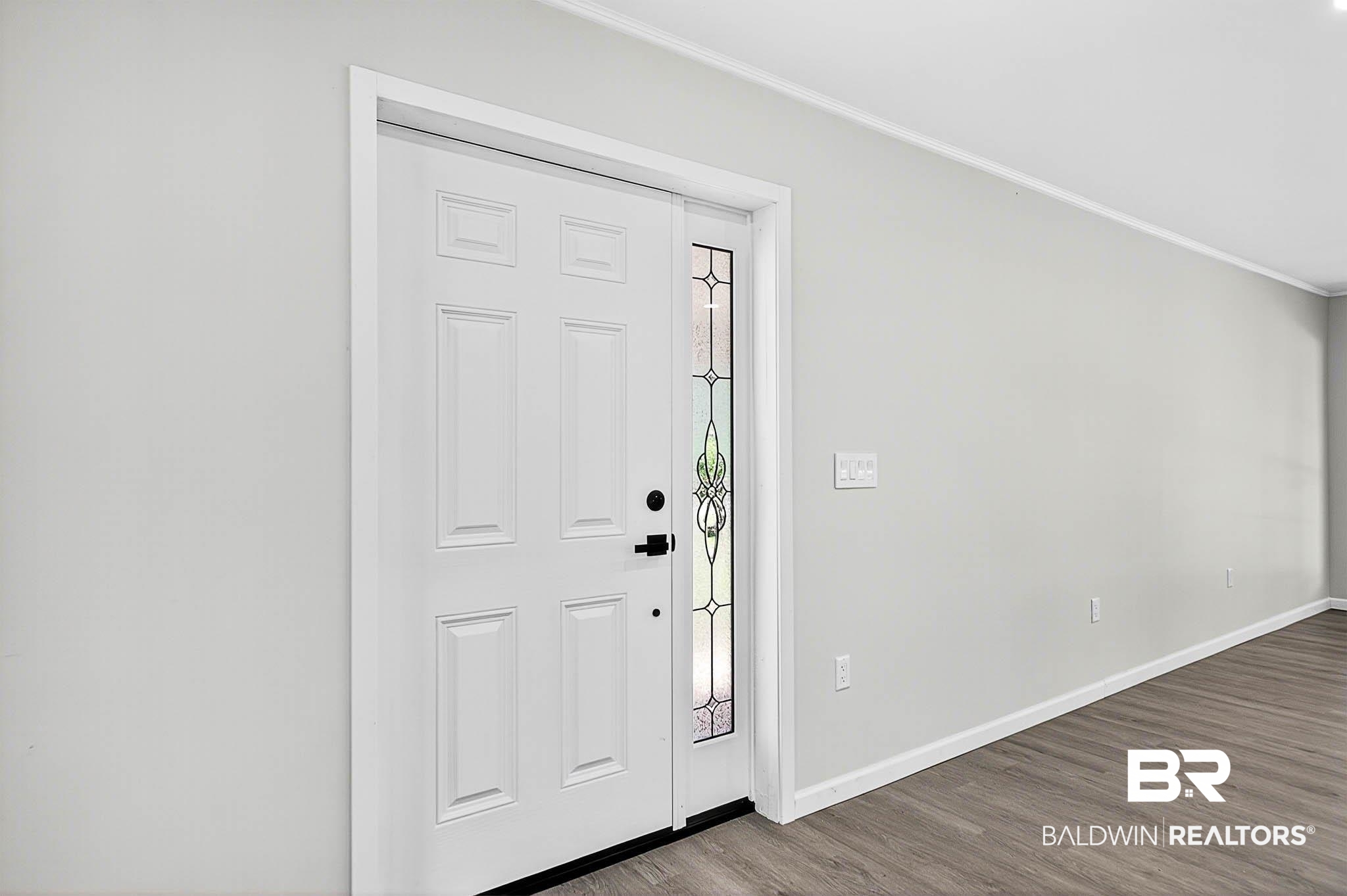 101 Terry Avenue Brewton, AL 36426 - Photo 24 of 48 Foyer with wood finished floors and crown molding