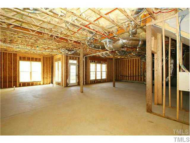 7329 Newport Avenue Raleigh, NC 27613 - Photo 13 of 17 a view of an empty room with a window