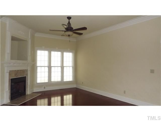 7329 Newport Avenue Raleigh, NC 27613 - Photo 14 of 17 a black and white photo of a living room
