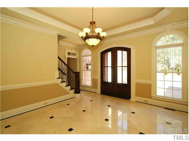 7329 Newport Avenue Raleigh, NC 27613 - Photo 2 of 17 a view of a living room with a large window