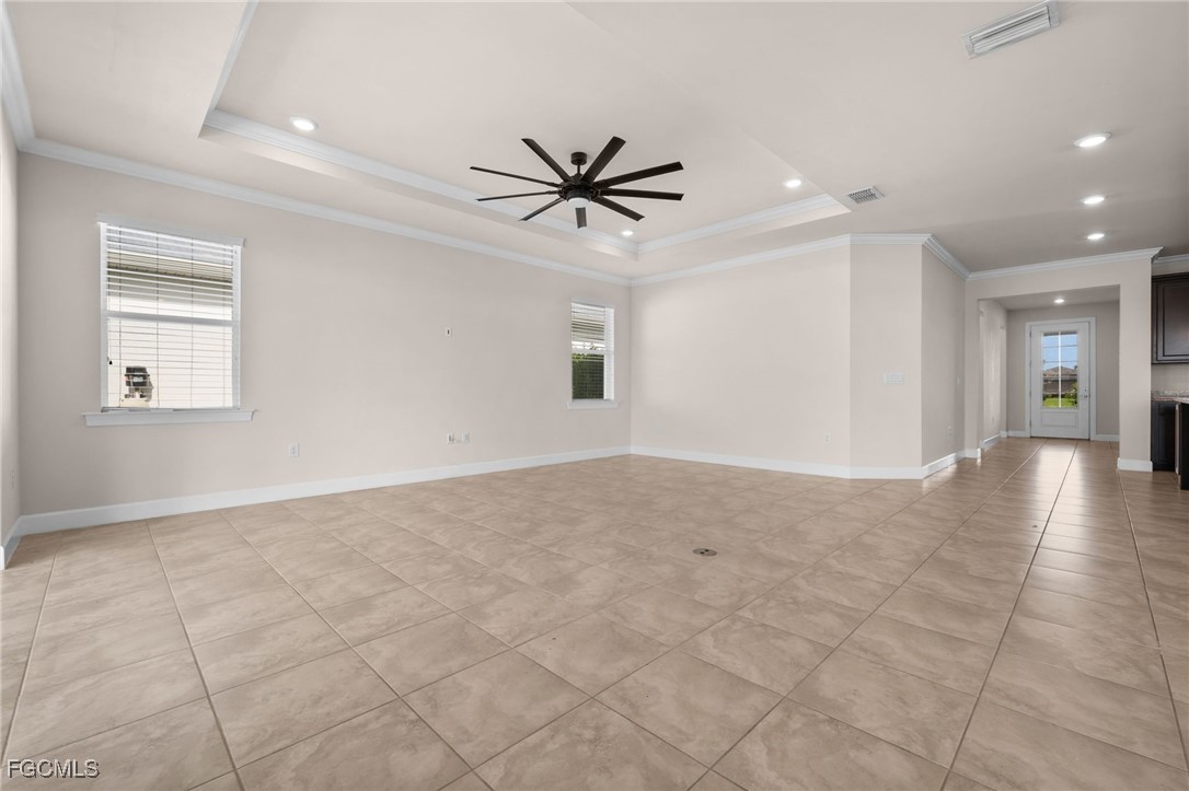 42346 Waterfront Way Punta Gorda, FL 33982 - Photo 16 of 46 a view of a livingroom with a ceiling fan and window