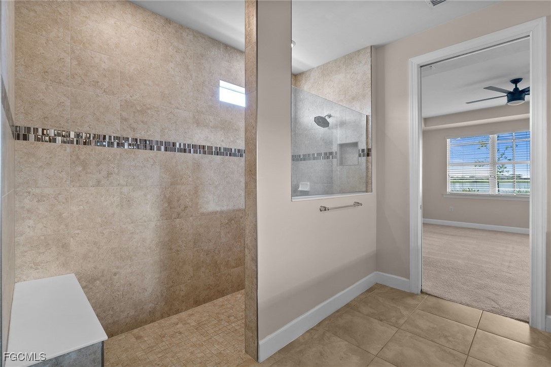 42346 Waterfront Way Punta Gorda, FL 33982 - Photo 25 of 46 a bathroom with a glass shower door