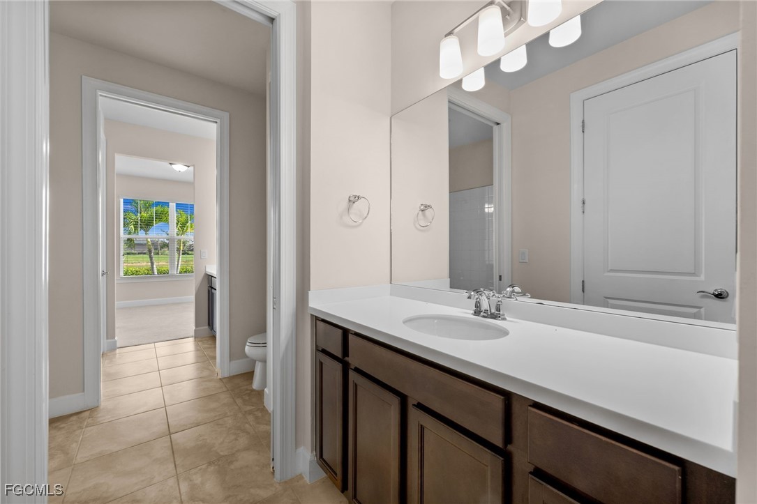 42346 Waterfront Way Punta Gorda, FL 33982 - Photo 27 of 46 a bathroom with a sink a vanity and a mirror