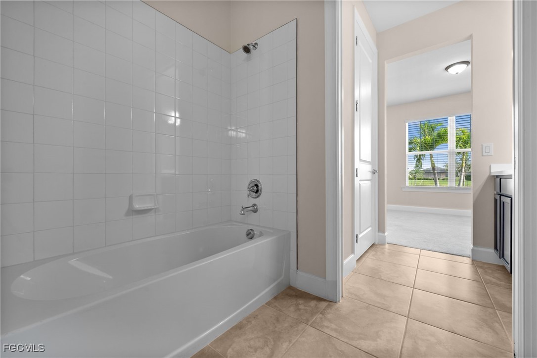 42346 Waterfront Way Punta Gorda, FL 33982 - Photo 28 of 46 a bathroom with a bathtub and shower