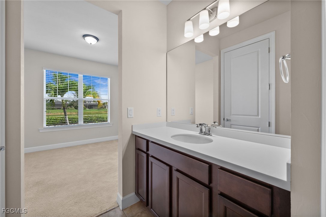 42346 Waterfront Way Punta Gorda, FL 33982 - Photo 29 of 46 a bathroom with a sink a vanity and a mirror