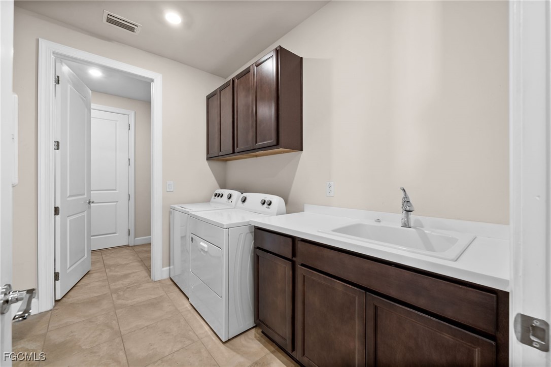 42346 Waterfront Way Punta Gorda, FL 33982 - Photo 31 of 46 a bathroom with a sink and a mirror