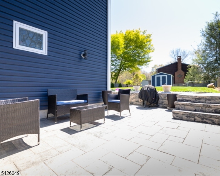 502 Atlas Road Landing, NJ 07850 - Photo 19 of 27 a view of a patio with couple of chairs and potted plants