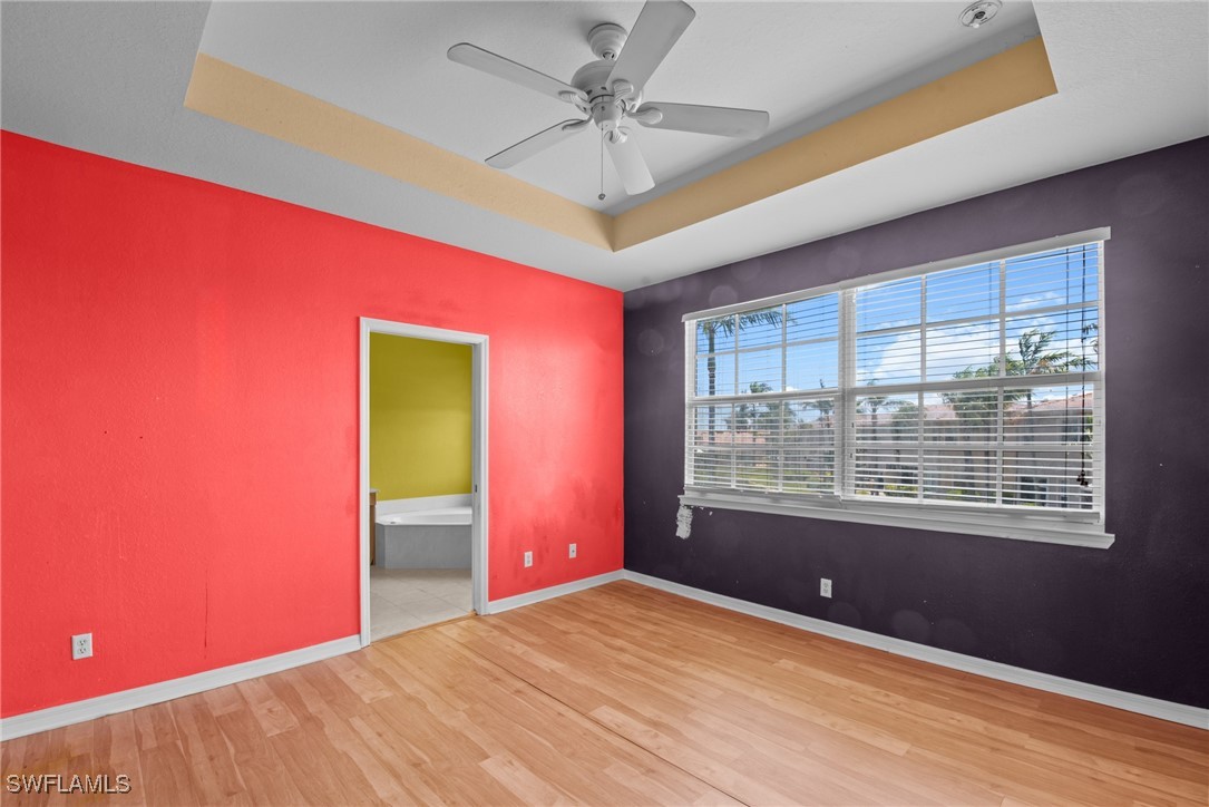 4031 Cherrybrook Loop Fort Myers, FL 33966 - Photo 12 of 34 a view of an empty room with a window