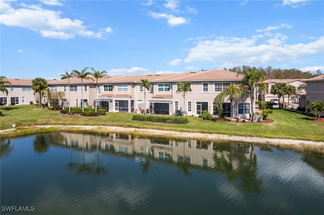 4031 Cherrybrook Loop Fort Myers, FL 33966 - Photo 26 of 34 a view of an house with swimming pool and chairs