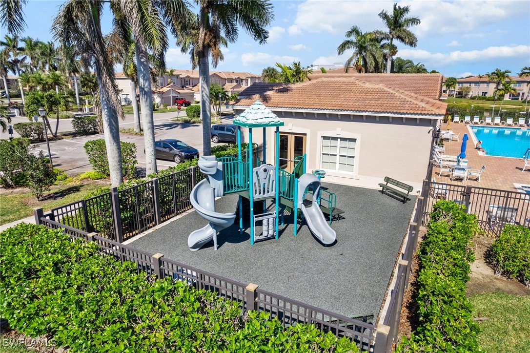 4031 Cherrybrook Loop Fort Myers, FL 33966 - Photo 34 of 34 an aerial view of a house with garden space and sitting area