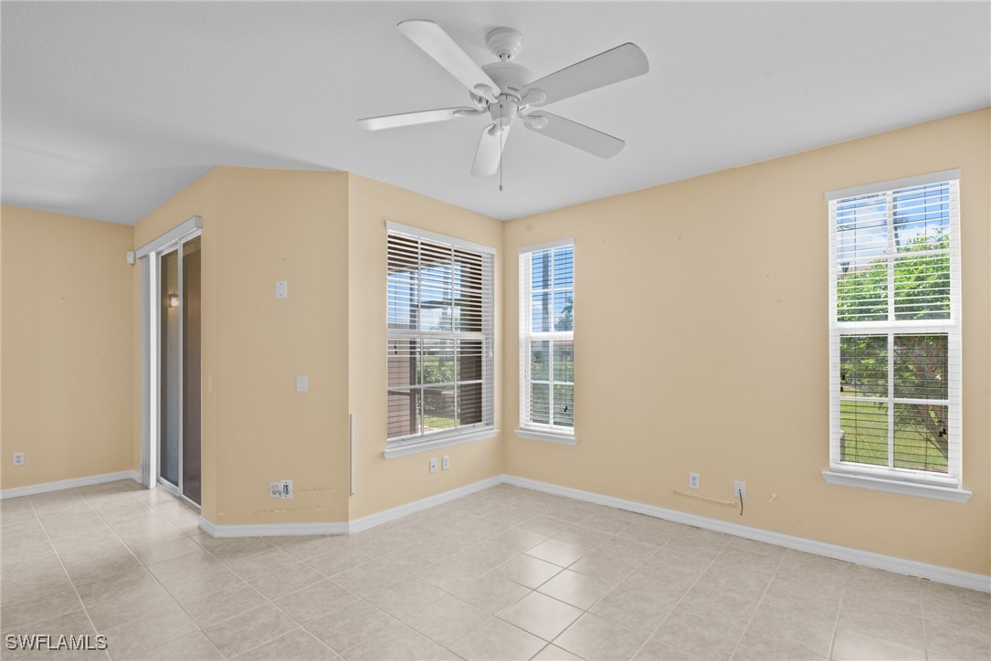4031 Cherrybrook Loop Fort Myers, FL 33966 - Photo 5 of 34 a view of an empty room with a window