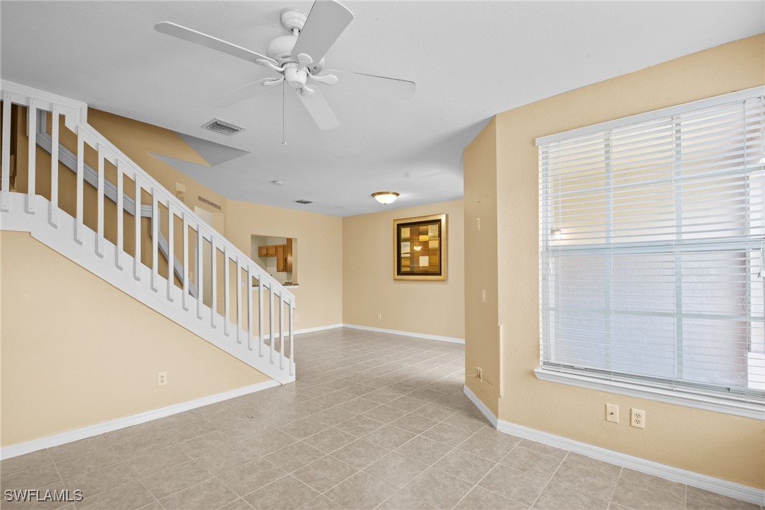 4031 Cherrybrook Loop Fort Myers, FL 33966 - Photo 6 of 34 an entryway with staircase