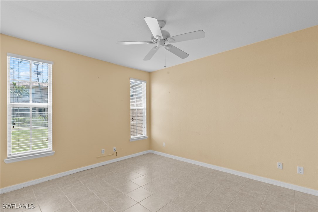 4031 Cherrybrook Loop Fort Myers, FL 33966 - Photo 9 of 34 a view of an empty room with a window