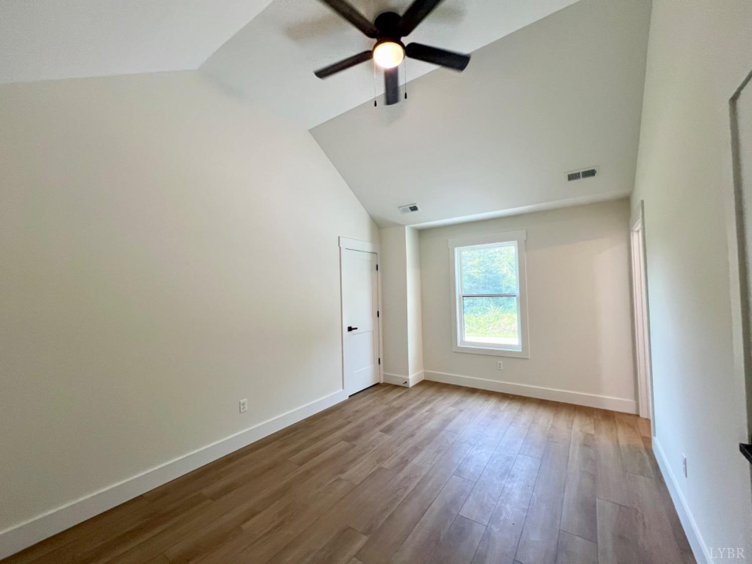 2638 Sunnymeade Road, Unit A&B Rustburg, VA 24588 - Photo 12 of 25 wooden floor in an empty room with a window