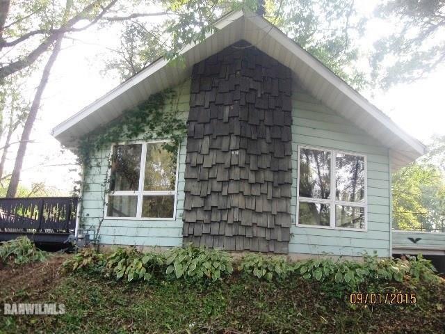 2055 Hillsdown Road Davis, IL 61019 - Photo 1 of 18 a house view with a garden space
