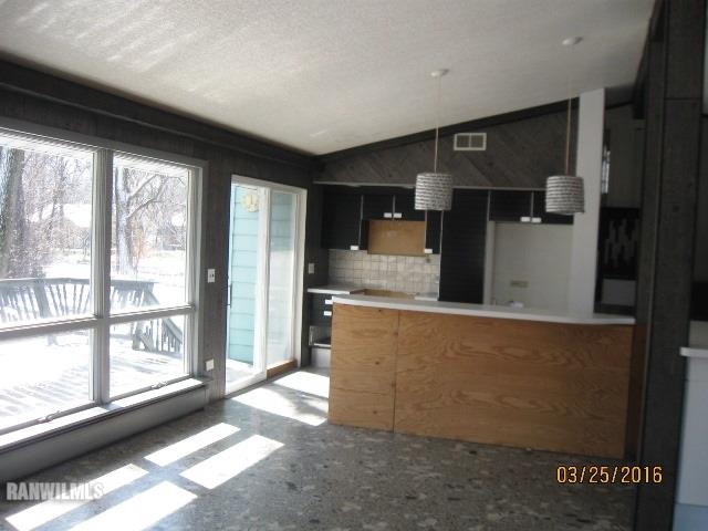 2055 Hillsdown Road Davis, IL 61019 - Photo 6 of 18 a living room with furniture and a large window