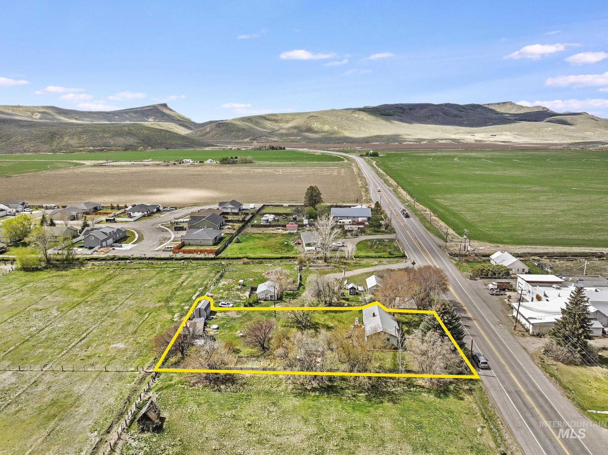 19591 Queen Crown Road Carey, ID 83320 - Photo 35 of 37 Expansive property parcel highlighted, featuring a primary residence and additional outbuildings