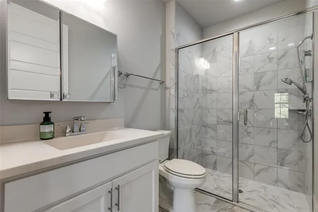 a view of a livingroom with furniture and staircase