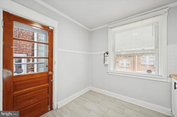 a view of empty room with a window