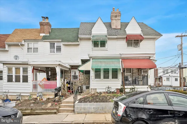 a front view of multiple houses