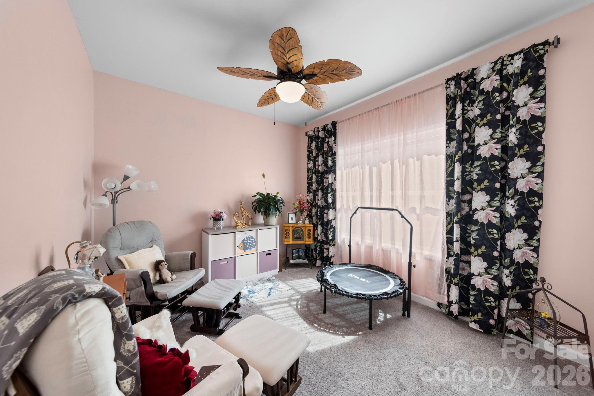 142 Will Evans Road Jefferson, SC 29718 - Photo 17 of 44 a living room with furniture flowers and a chandelier