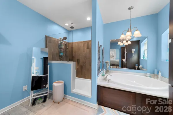 a bathroom with a sink double vanity and a mirror