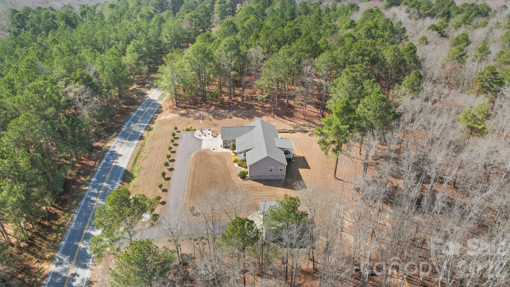 142 Will Evans Road Jefferson, SC 29718 - Photo 36 of 44 a view of a yard with trees