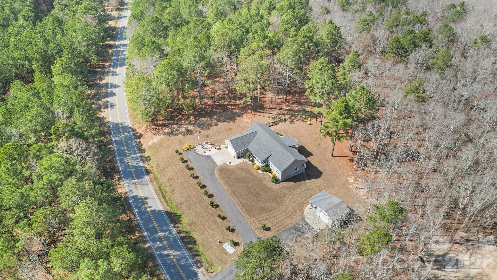 142 Will Evans Road Jefferson, SC 29718 - Photo 37 of 44 an aerial view of residential house with outdoor space