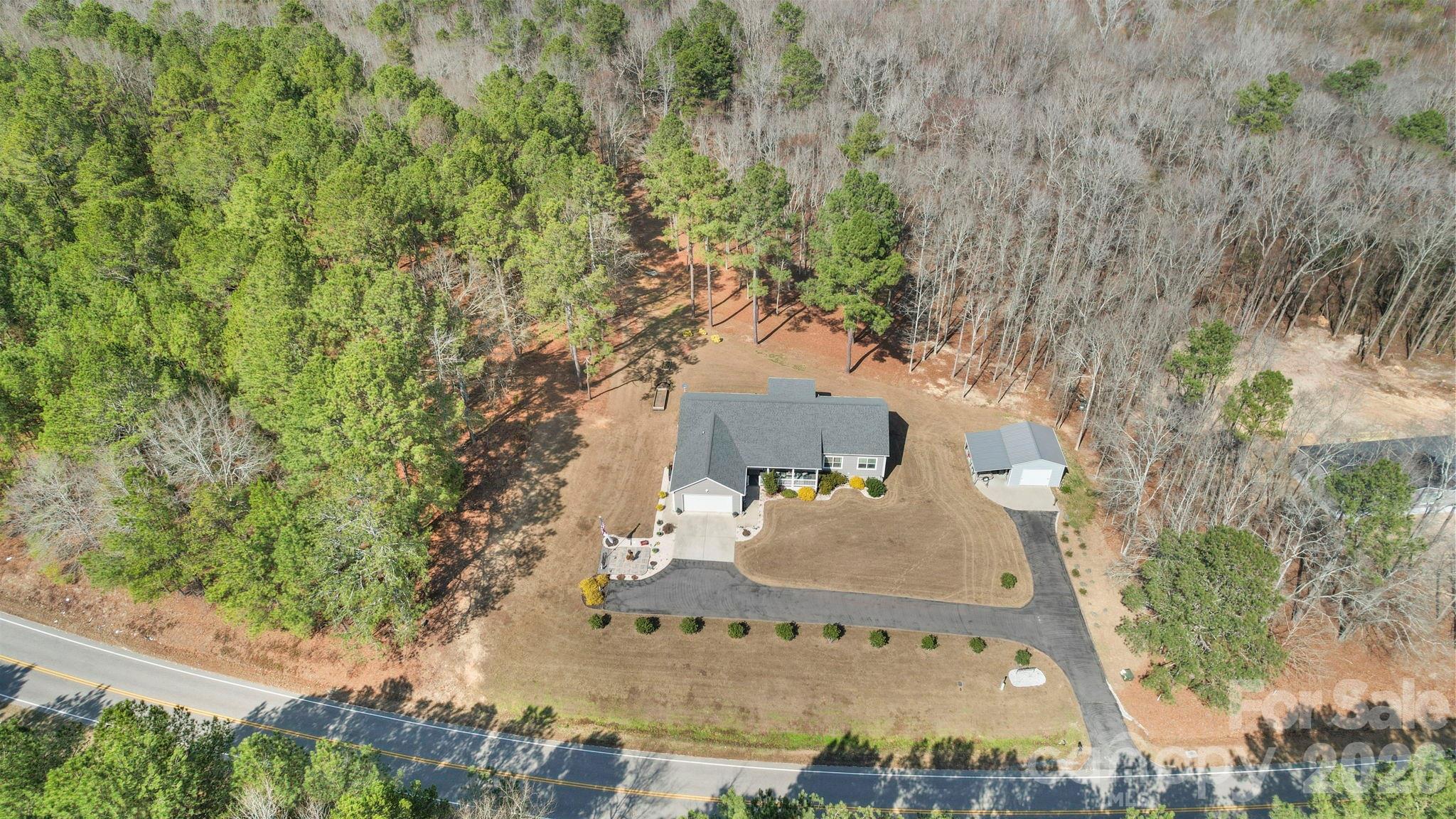 142 Will Evans Road Jefferson, SC 29718 - Photo 38 of 44 an aerial view of a house with yard