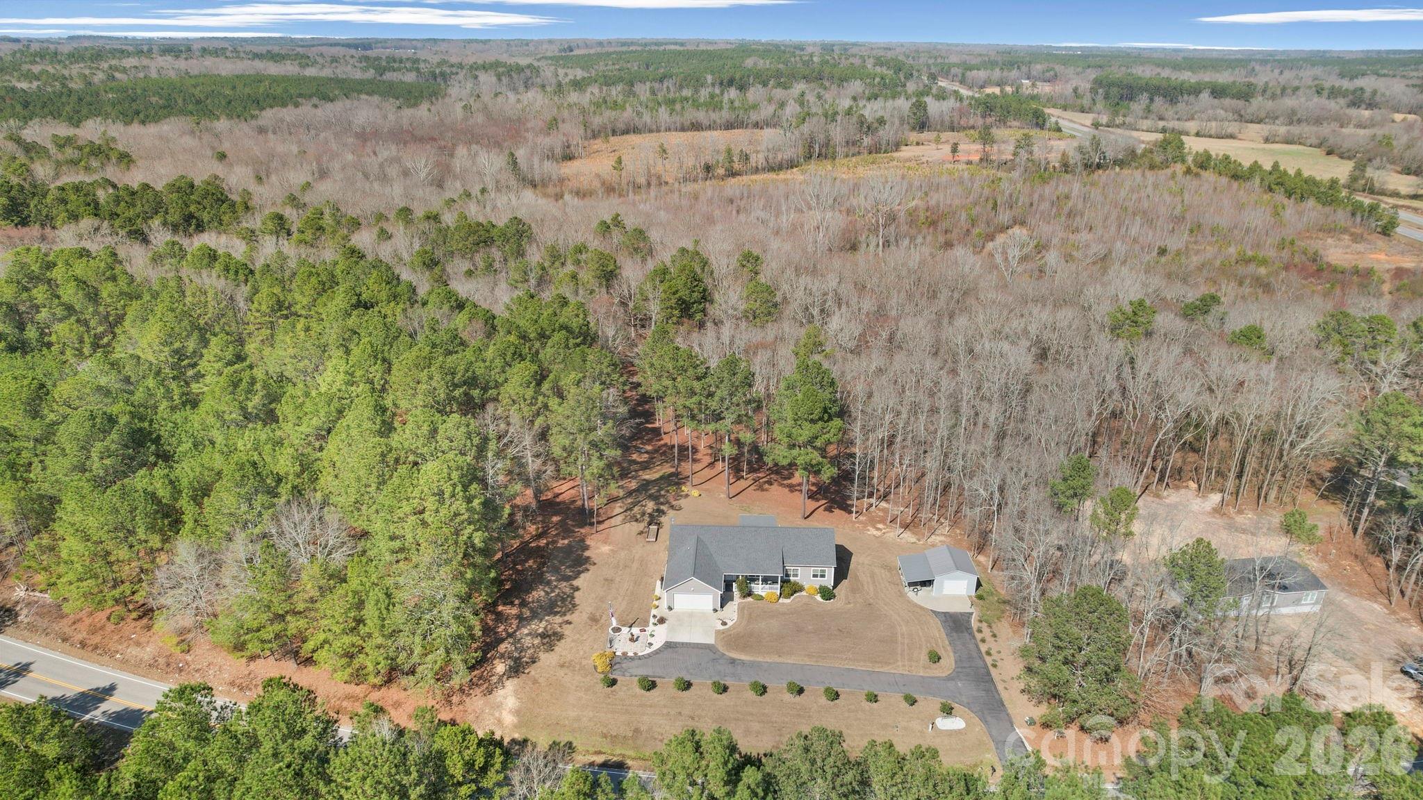 142 Will Evans Road Jefferson, SC 29718 - Photo 39 of 44 an aerial view of a houses with yard
