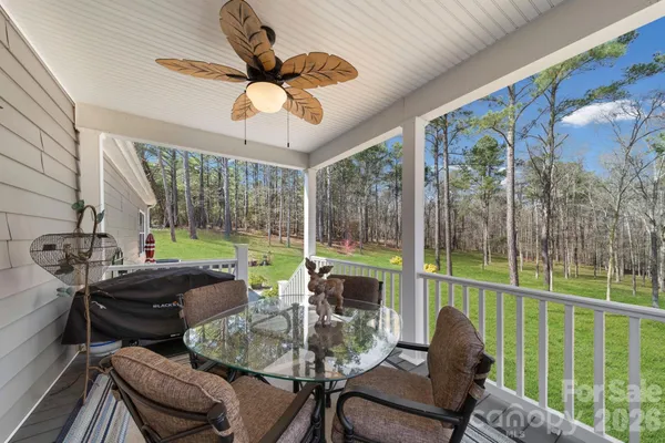 a room with furniture and a large window