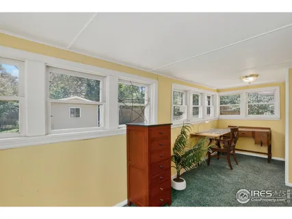 a view of a living room and a window