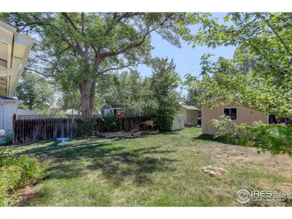 a view of a back yard of the house