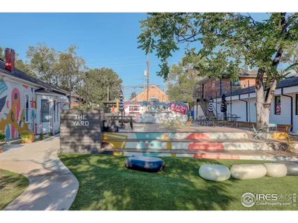 a view of a building with sitting area