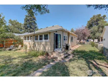 a view of a house with a garden