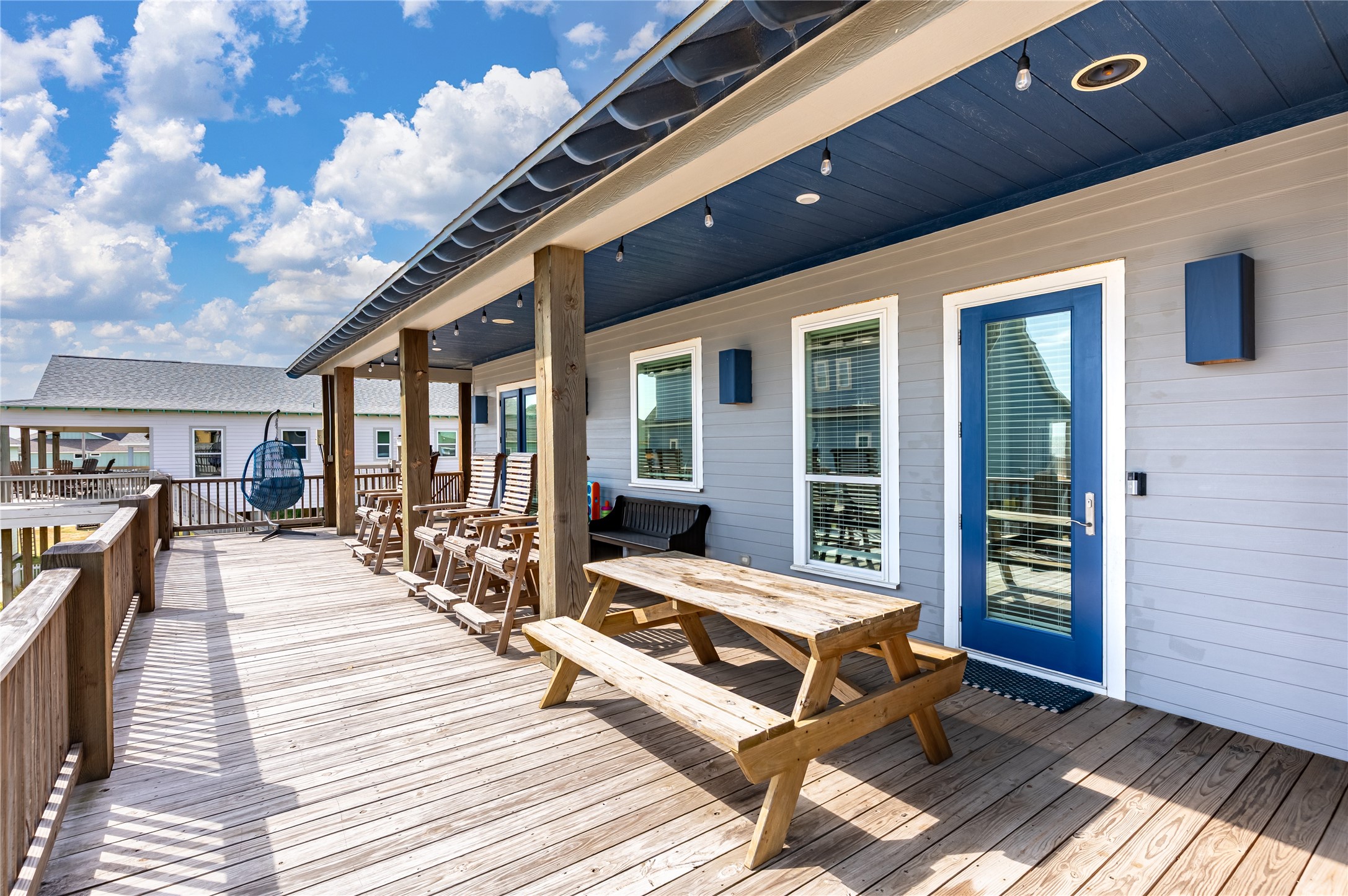 2576 Whitecap Crystal Beach, TX 77650 - Photo 13 of 49 a view of a house with lounge chair and wooden floor