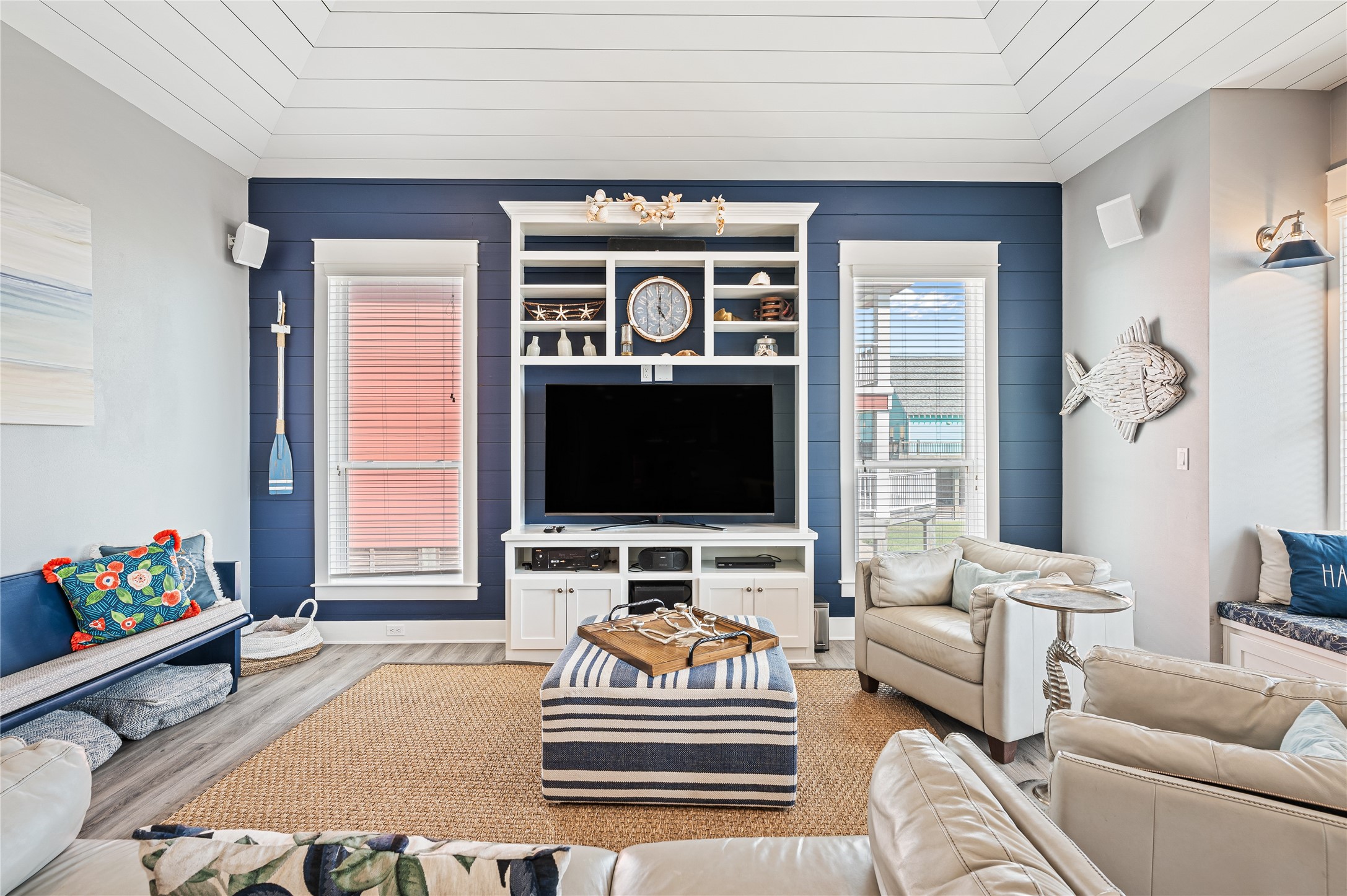 2576 Whitecap Crystal Beach, TX 77650 - Photo 15 of 49 a living room with furniture and a flat screen tv