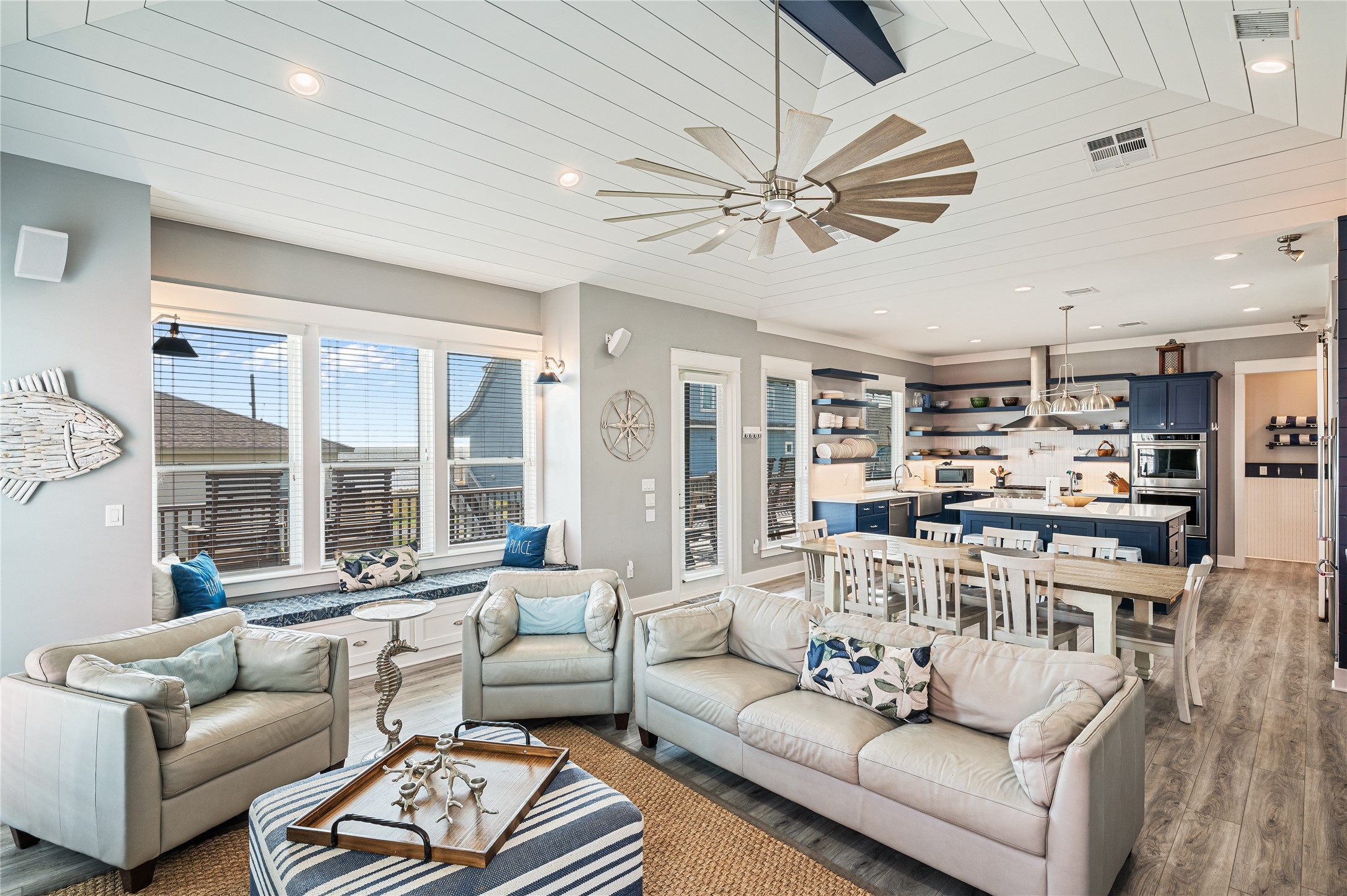 2576 Whitecap Crystal Beach, TX 77650 - Photo 16 of 49 a living room with furniture and a large window