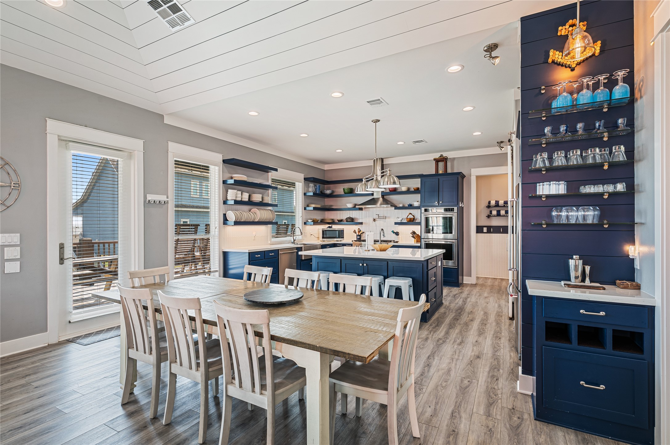 2576 Whitecap Crystal Beach, TX 77650 - Photo 17 of 49 a view of a dining room with furniture and wooden floor