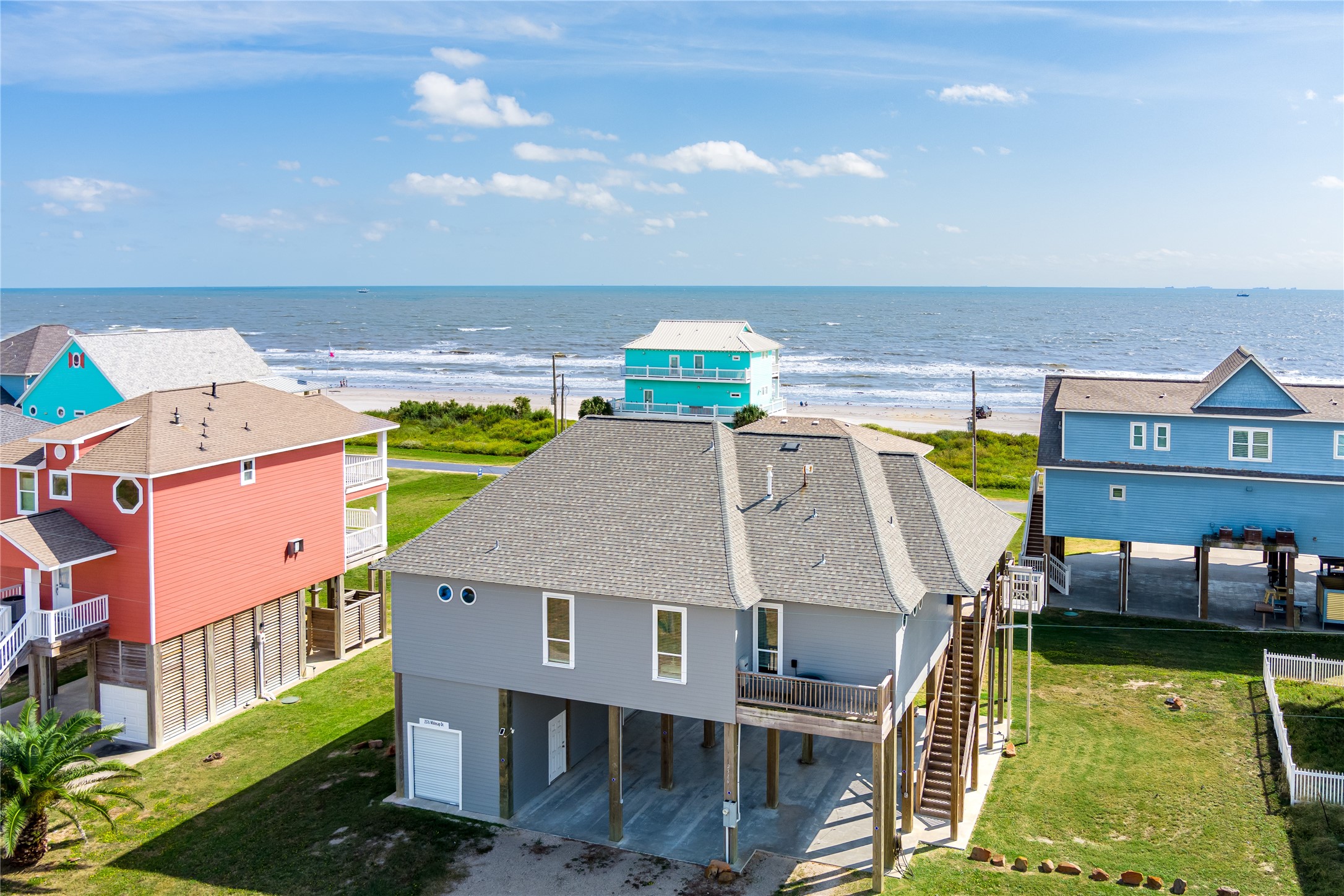 2576 Whitecap Crystal Beach, TX 77650 - Photo 2 of 49 an aerial view of a house with swimming pool and seating space
